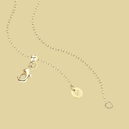 Tobias - Gouden Munt Ketting met Maan en Zon Design